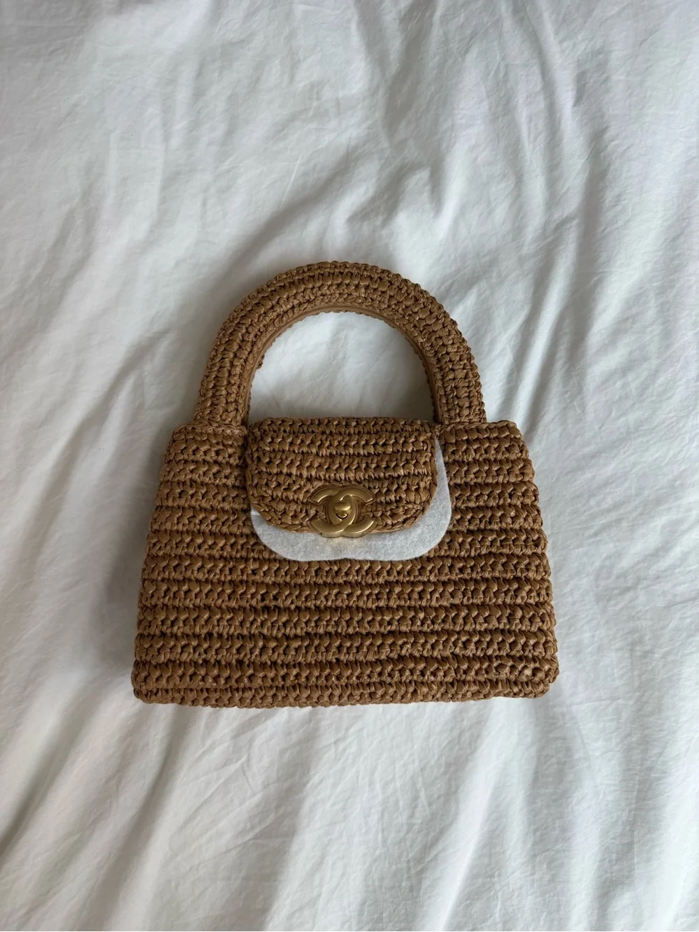 CHANEL Kelly raffia top-handle bag